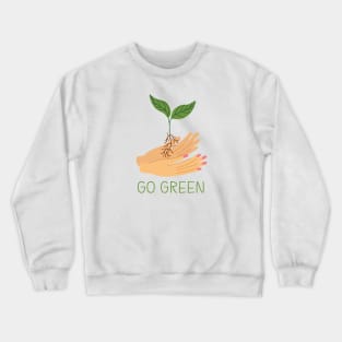 Hands holding green sprout. Crewneck Sweatshirt